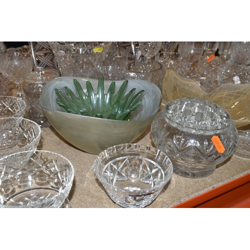 433 - A GROUP OF CUT CRYSTAL, comprising three Dartington Crystal wine glasses, an apricot coloured Murano... 