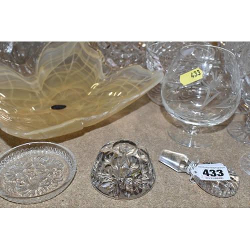 433 - A GROUP OF CUT CRYSTAL, comprising three Dartington Crystal wine glasses, an apricot coloured Murano... 