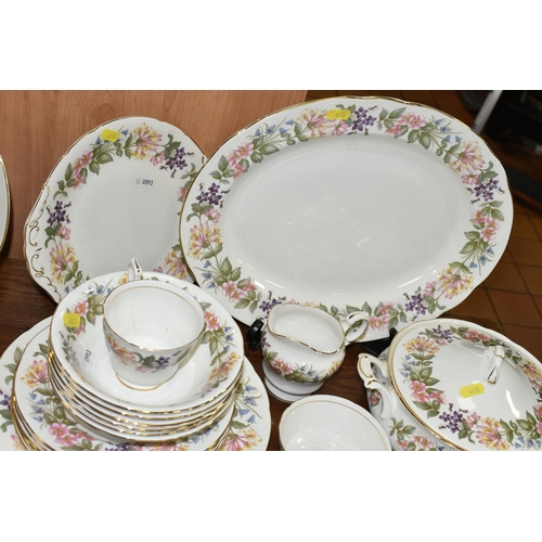 448 - A QUANTITY OF PARAGON/ROYAL ALBERT 'COUNTRY LANE' PATTERN DINNERWARE, comprising one large oval meat... 