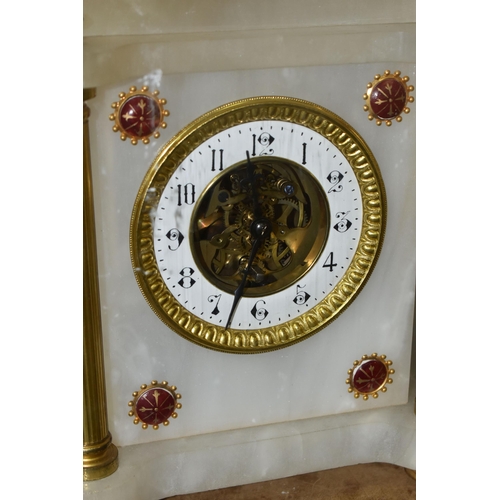 452 - A LATE 19TH CENTURY FRENCH ALABASTER MANTEL CLOCK UNDER A GLASS DOME, the rectangular clock with gil... 