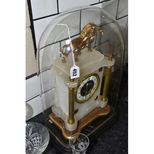 452 - A LATE 19TH CENTURY FRENCH ALABASTER MANTEL CLOCK UNDER A GLASS DOME, the rectangular clock with gil... 