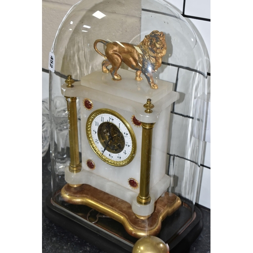 452 - A LATE 19TH CENTURY FRENCH ALABASTER MANTEL CLOCK UNDER A GLASS DOME, the rectangular clock with gil... 