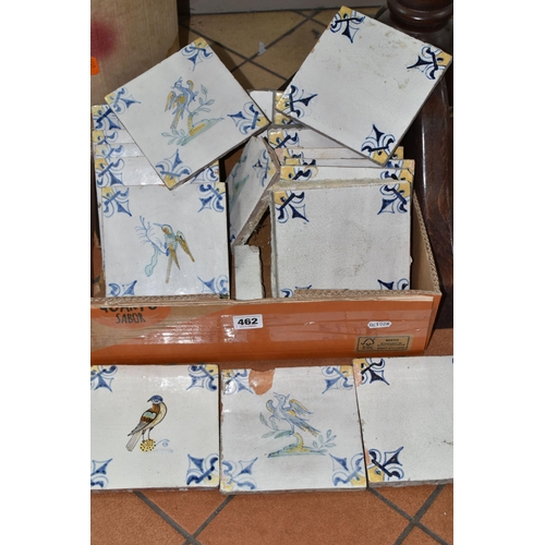 462 - A BOX OF DELFT STYLE TILES, seventeen tin glazed red earthenware tiles, comprising eight tiles paint... 