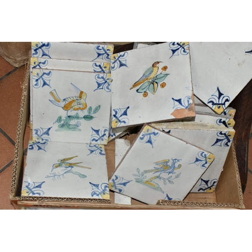 462 - A BOX OF DELFT STYLE TILES, seventeen tin glazed red earthenware tiles, comprising eight tiles paint... 