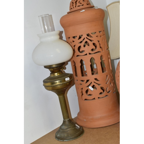 475 - A GROUP OF TABLE LAMPS, to include five table lamps, a large pierced terracotta lamp, full height 10... 