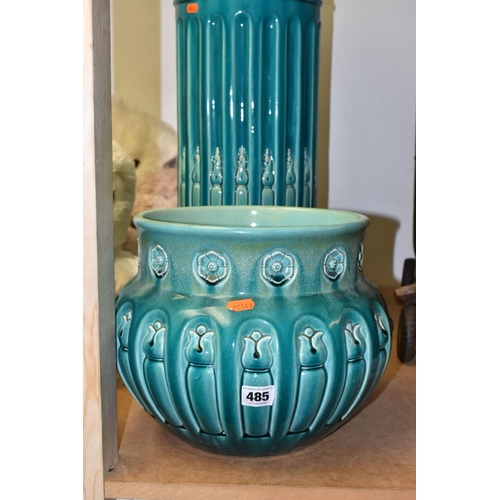 485 - A BRETBY JARDINIERE AND STAND, an arts and crafts style turquoise glazed pottery jardiniere with a m... 