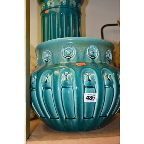 485 - A BRETBY JARDINIERE AND STAND, an arts and crafts style turquoise glazed pottery jardiniere with a m... 