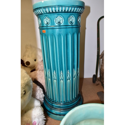 485 - A BRETBY JARDINIERE AND STAND, an arts and crafts style turquoise glazed pottery jardiniere with a m... 