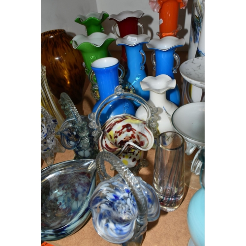 487 - A GROUP OF COLOURED GLASSWARE, comprising an opaque blue and white glass jug with a clear frilled ha... 