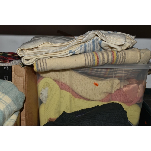 489 - FIVE BOXES OF TEXTILES, SHOES AND CLOTHING, to include a large quantity of vintage woollen blankets ... 