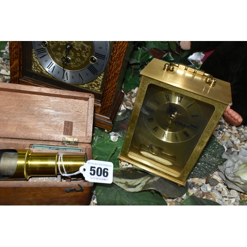 506 - A DRUM MICROSCOPE, A MANTEL CLOCK AND TWO CARRIAGE CLOCKS, comprising a drum microscope in its woode... 