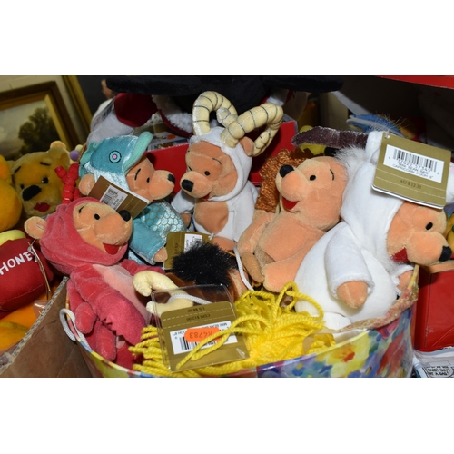 516 - A COLLECTION OF MODERN WINNIE THE POOH SOFT TOYS, assorted sizes and makers includes Disney Store Ho... 