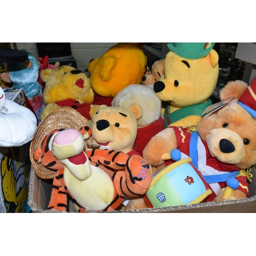 516 - A COLLECTION OF MODERN WINNIE THE POOH SOFT TOYS, assorted sizes and makers includes Disney Store Ho... 