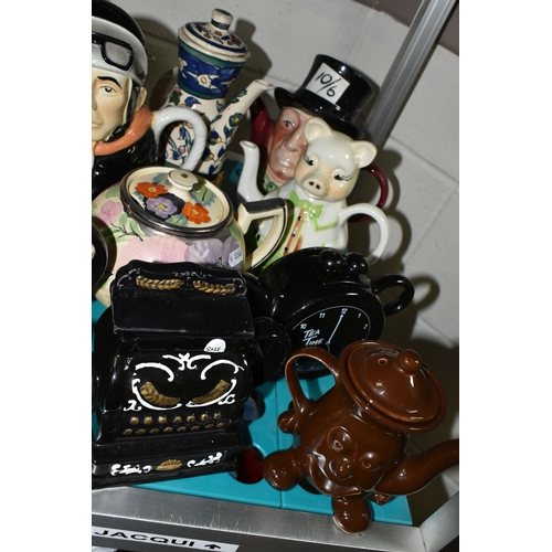 520 - NINETEEN NOVELTY AND DECORATIVE TEAPOTS, to include  a Carlton Ware 'Red Baron' teapot and another C... 