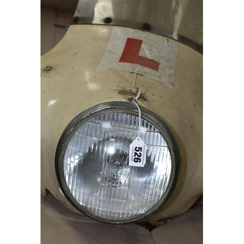 526 - A 1950'S/1960'S MOTORCYCLE FAIRING, of fibreglass construction with windscreen and Lucas headlamp le... 