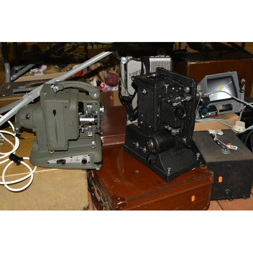 536 - A COLLECTION OF EARLY TO MID 20TH CENTURY FILM PROJECTORS, comprising an Aldis 303 slide projector, ... 