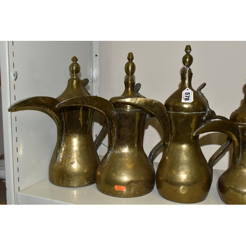 578 - TEN LATE 19TH / 20TH CENTURY MIDDLE EASTERN BRASS DALLAH, some with residual tinning, eight plain an... 