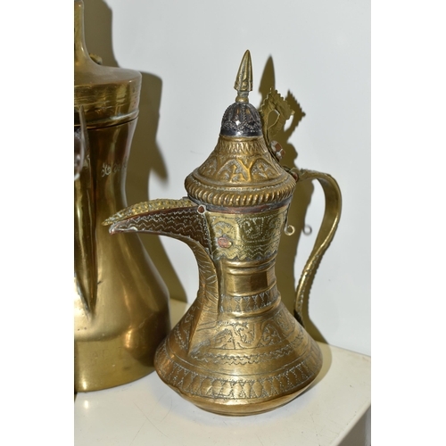 578 - TEN LATE 19TH / 20TH CENTURY MIDDLE EASTERN BRASS DALLAH, some with residual tinning, eight plain an... 