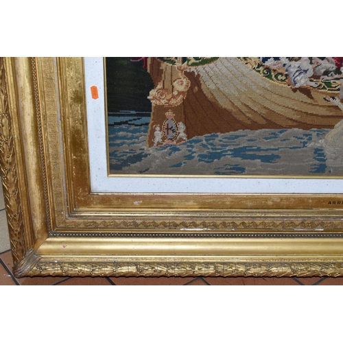 605 - A LATE VICTORIAN TAPESTRY, of a 17th Century scene of Royalty in a boat approaching a jetty, the gil... 