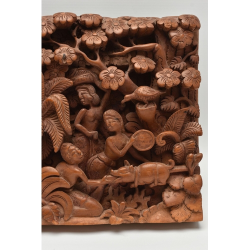 135A - A SECOND HALF 20TH CENTURY BALINESE HIGH RELIEF CARVED RECTANGULAR TEAK PANEL, depicting figures and... 