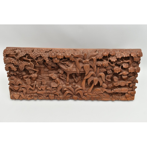 135A - A SECOND HALF 20TH CENTURY BALINESE HIGH RELIEF CARVED RECTANGULAR TEAK PANEL, depicting figures and... 