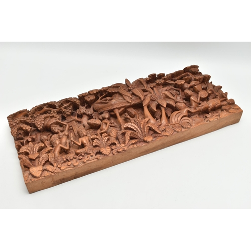 135A - A SECOND HALF 20TH CENTURY BALINESE HIGH RELIEF CARVED RECTANGULAR TEAK PANEL, depicting figures and... 