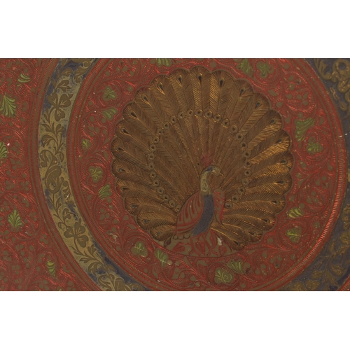 215A - A MID 20TH CENTURY INDIAN BRASS TRAY WITH ENAMELLED AND ENGRAVED DECORATION, with a peacock design t... 