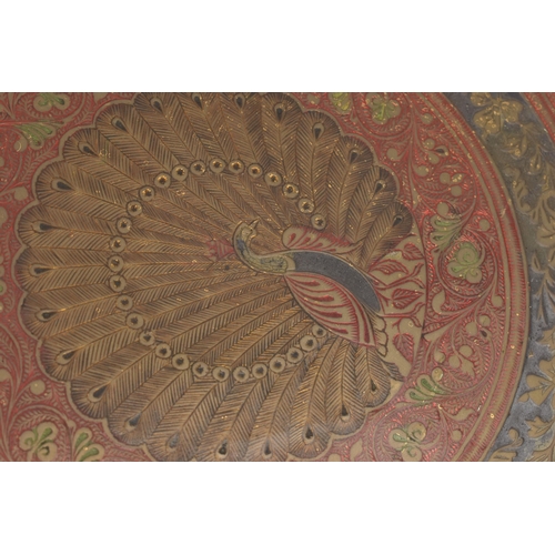 215A - A MID 20TH CENTURY INDIAN BRASS TRAY WITH ENAMELLED AND ENGRAVED DECORATION, with a peacock design t... 