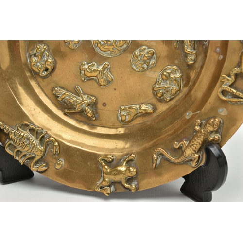 225A - A LATE 19TH CENTURY BRASS PLATTER APPLIED WITH CAST BRASS REPTILES, INSECTS, ANIMALS AND FIGURES, in... 