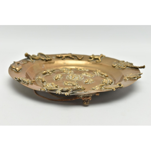 225A - A LATE 19TH CENTURY BRASS PLATTER APPLIED WITH CAST BRASS REPTILES, INSECTS, ANIMALS AND FIGURES, in... 