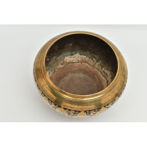 235A - AN INDIAN HEAVY BRASS AND BLACK ENAMELLED JARDINIERE, engraved with a foliate design of stylised lot... 