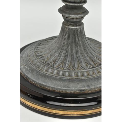 375A - A LATE VICTORIAN BRITANNIA METAL / SPELTER OIL LAMP BASE, cast with two Egyptian busts and raised fo... 