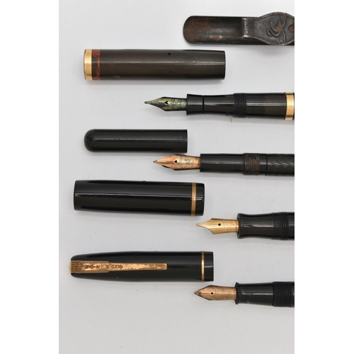 380A - FOUR VINTAGE PENS AND A SWAN BRAND STEEL POCKET PEN CLIP, the pens comprising a Swan self-filler Mab... 