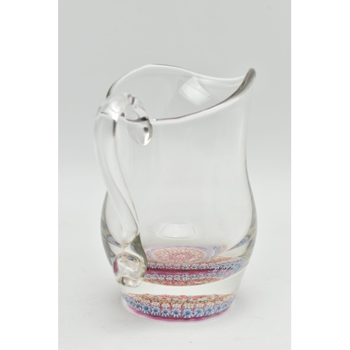 50A - A VICTORIAN STYLE CLEAR GLASS PAPERWEIGHT CREAM JUG OF BALUSTER FORM, with millefiori cane base, hei... 