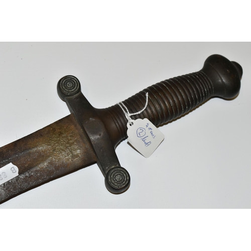 181 - AN ARAB JAMBIYA DAGGER, in its original  tooled scabbard with a flared end to its hilt and fitted wi... 