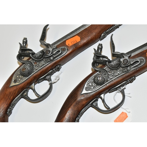 187 - FOUR REPLICA PISTOLS, three based on the flintlock design and one on a double barrel side by side pi... 