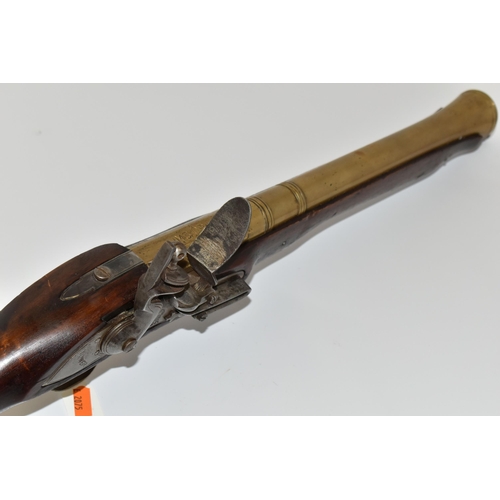 202 - AN OLD REPLICA OF A BRASS BARREL FLINTLOCK BLUNDERBUSS, only bored through for part of its barrel le... 