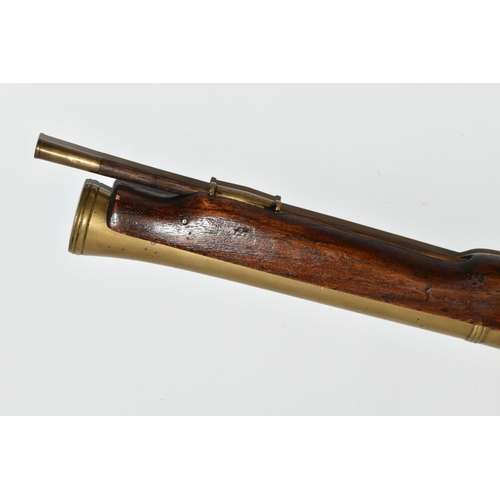 202 - AN OLD REPLICA OF A BRASS BARREL FLINTLOCK BLUNDERBUSS, only bored through for part of its barrel le... 