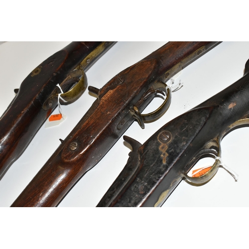 205 - THREE ANTIQUE GUNS, comprising an antique percussion single barrel three band musket with flared muz... 