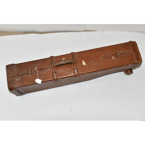 207 - A GOOD QUALITY LEATHER SHOTGUN CASE WITH METALLIC LOCK, its case straps need replacing