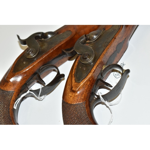 214 - AN ANTIQUE PAIR OF 15 BORE SINGLE BARREL SMOOTH BORE PERCUSSION PISTOLS BEARING THE NAME LE PAGE PAR... 