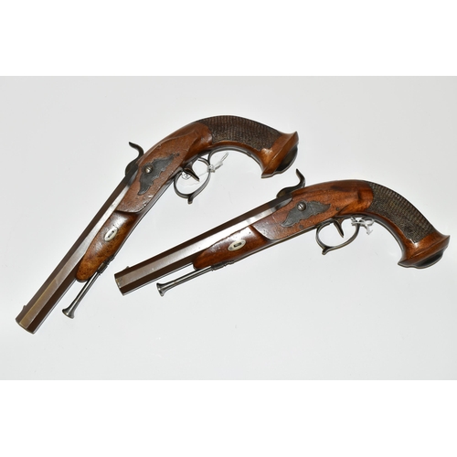 214 - AN ANTIQUE PAIR OF 15 BORE SINGLE BARREL SMOOTH BORE PERCUSSION PISTOLS BEARING THE NAME LE PAGE PAR... 