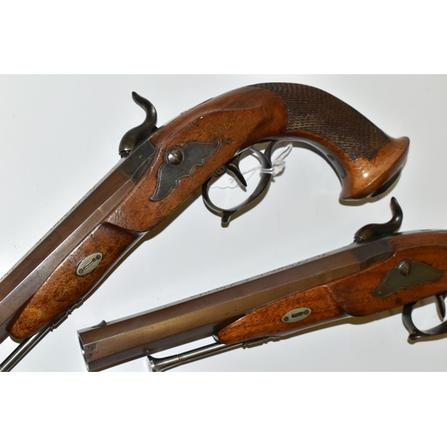 214 - AN ANTIQUE PAIR OF 15 BORE SINGLE BARREL SMOOTH BORE PERCUSSION PISTOLS BEARING THE NAME LE PAGE PAR... 