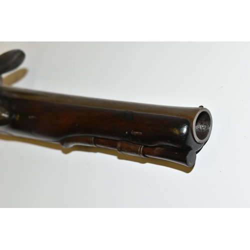 218 - AN ANTIQUE 23 BORE FLINTLOCK HOLSTER PISTOL FITTED WITH AN 8'' BARREL, its lock is marked Collumbell... 