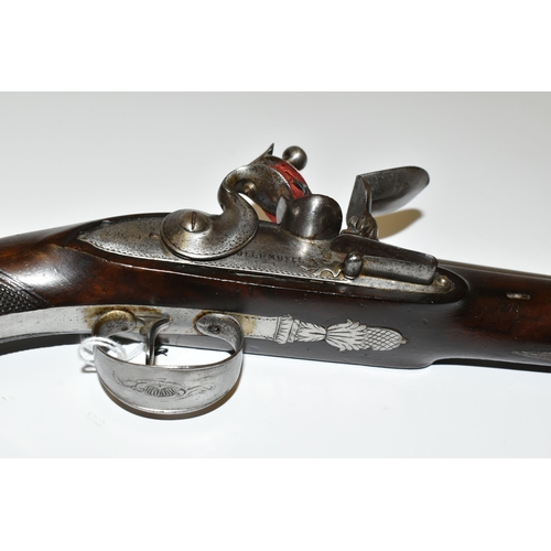 218 - AN ANTIQUE 23 BORE FLINTLOCK HOLSTER PISTOL FITTED WITH AN 8'' BARREL, its lock is marked Collumbell... 