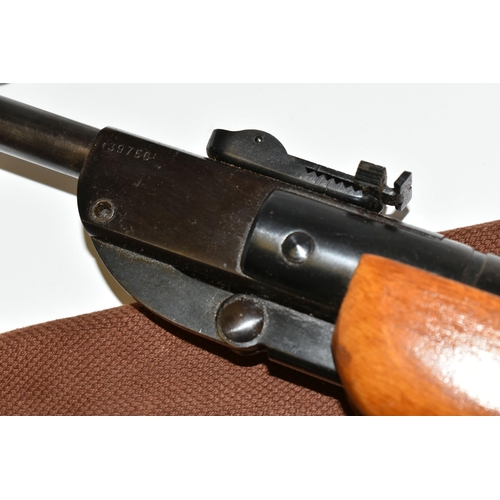 229 - A .22'' HAENEL MODEL 302 AIR RIFLE, serial number 439756, in good working order, its metal work is l... 