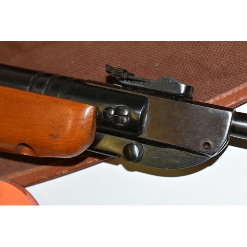 229 - A .22'' HAENEL MODEL 302 AIR RIFLE, serial number 439756, in good working order, its metal work is l... 