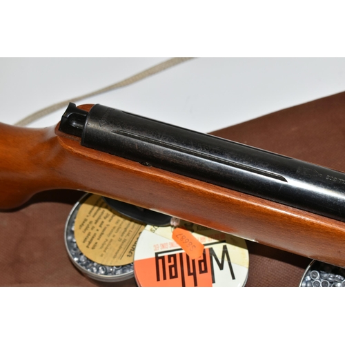 229 - A .22'' HAENEL MODEL 302 AIR RIFLE, serial number 439756, in good working order, its metal work is l... 