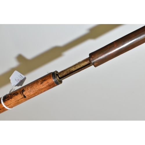 232 - AN ANTIQUE 7MM CENTREFIRE WALKING STICK SHOTGUN IN WORKING ORDER, its handle is made from a  deer's ... 