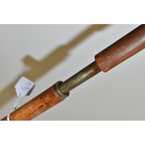 232 - AN ANTIQUE 7MM CENTREFIRE WALKING STICK SHOTGUN IN WORKING ORDER, its handle is made from a  deer's ... 